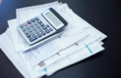 calculator on stack of bills