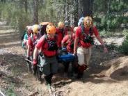 Search and Rescue team carrying stretcher