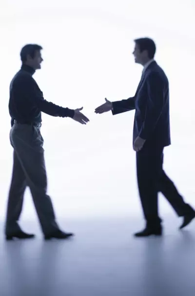 Two people shaking hands