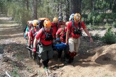 Search and Rescue team carrying stretcher